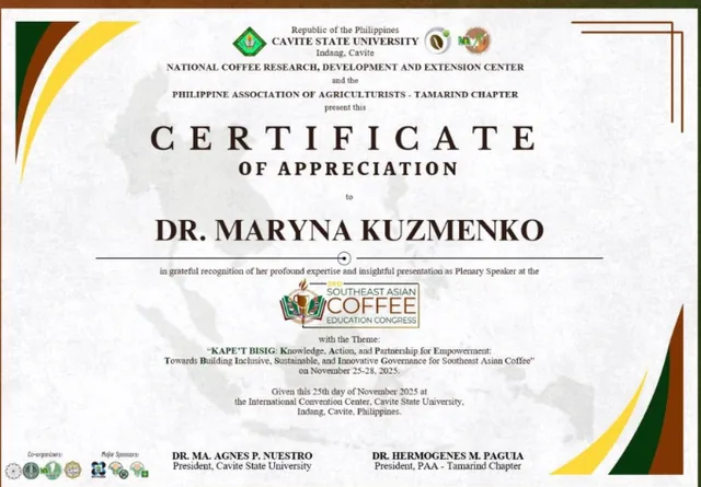 A certificate of appreciation from Cavite State University, its National Coffee Research, Development and Extension Center, and the Philippine Association of Agriculturists, presented to Dr. Maryna Kuzmenko in recognition of her presentation as plenary speaker at the Southeast Asian Coffee Education Congress, dated 25 November 2025.